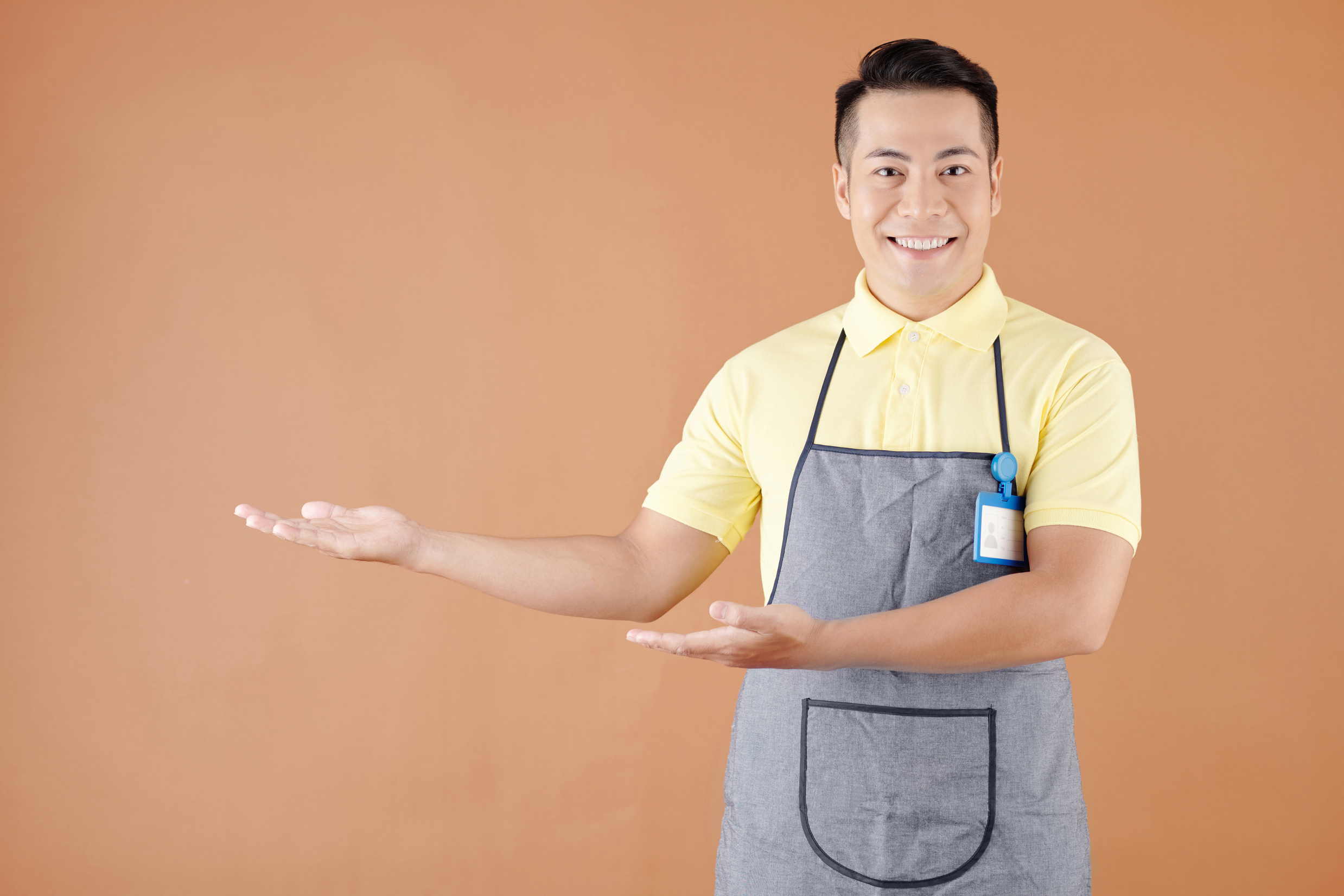 Hospitable Waiter Welcoming Customers